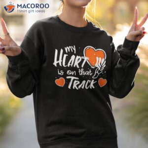 my heart is on that track and field mom shirt sweatshirt 2