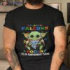 Baby Yoda Hug Atlanta Falcons Autism Rockin To A Different Tune Shirt