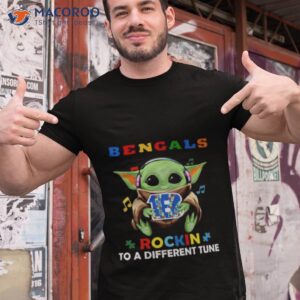 baby yoda hug cincinnati bengals autism rockin to a different tune shirt tshirt 1