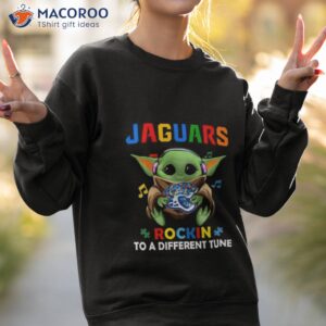 baby yoda hug jacksonville jaguars autism rockin to a different tune shirt sweatshirt 2