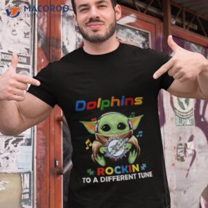 baby yoda hug miami dolphins autism rockin to a different tune shirt tshirt 1