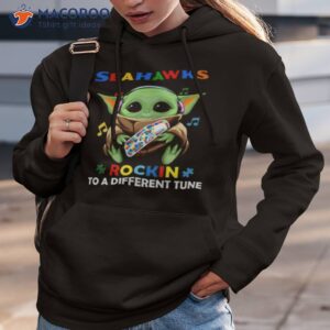 baby yoda hug seattle seahawks autism rockin to a different tune shirt hoodie 3
