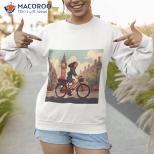 woman on bicycle in westminster london shirt sweatshirt 1