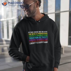 in this house we believe the news is propaganda the state is organized crime taxation is theft shirt hoodie 1