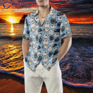 pug poses in a blue hawaiian shirt for 4