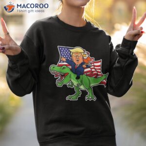 trump riding a dinosaur trex funny merica patriotic july 4th shirt sweatshirt 2
