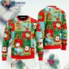 A Funny Pomeranian Wears An Ugly Christmas Sweater With Reindeer Pattern For The Holiday.