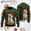 A Golden Retriever Puppy Is Wearing An Ugly Christmas Sweater With Santa Hat.