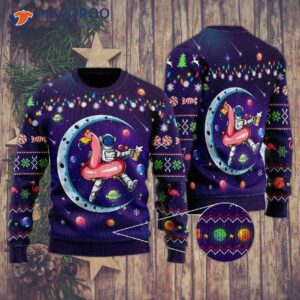 Funny Astronauts Sit On Flamingo Floats In Space With The Planet Wearing An Ugly Christmas Sweater.