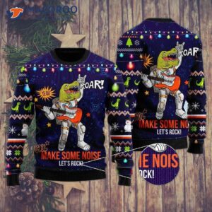 Funny T-rex Plays Rock Music Among Stars, Planets, And Galaxies On An Ugly Christmas Sweater.