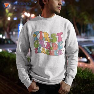 groovy first grade teacher happy day of school kids shirt sweatshirt