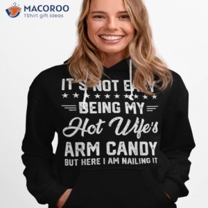 its not easy being my hot wifes arm candy humor husband joke shirt hoodie 1