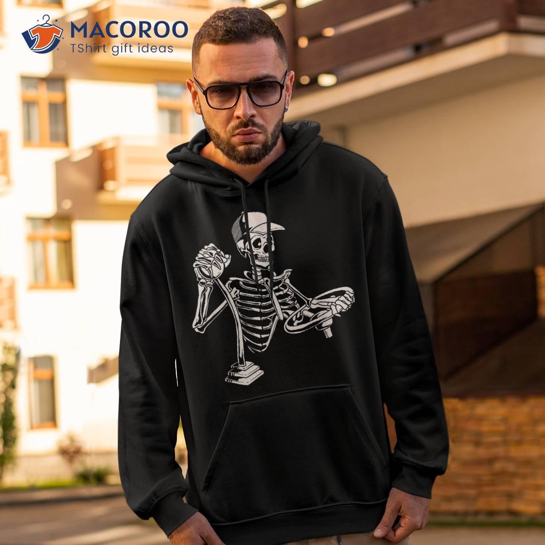 https://images.macoroo.com/wp-content/uploads/2023/07/skeleton-truck-driver-funny-big-trucking-trucker-shirt-hoodie-2.jpg