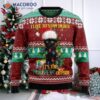The Black Cat Likes To Stay In Bed Wearing An Ugly Christmas Sweater.