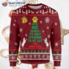 The Cat Wore An Ugly Christmas Sweater Around Tree.