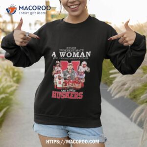 never underestimate a woman who understands football and loves nebraska corn huskers 2023 shirt sweatshirt 1