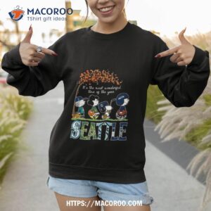 peanuts character it s the most wonderful time of the year seattle seahawks mariners kraken and storm 2023 shirt sweatshirt