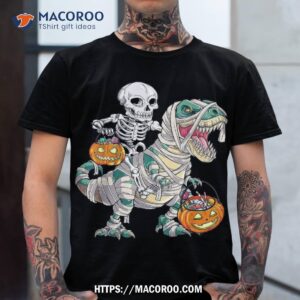 skeleton riding mummy dinosaur t rex halloween funny pumpkin shirt spooky scary skeletons tshirt