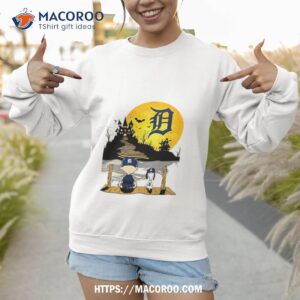 Snoopy Charlie Brown Sit Under Moon Detroit Tigers Halloween Shirt 2 snoopy charlie brown sit under moon detroit tigers halloween shirt sweatshirt 1