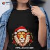 Adorable Christmas Lion Donning A Santa Claus Hat Shirt