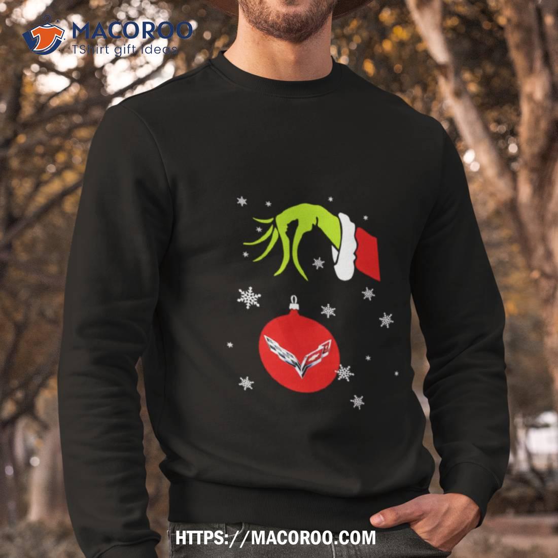 grinch holding ornament shirt