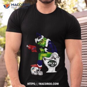 New England Patriots Grinch Sitting On New York Jets Toilet And Step On Miami Dolphins Helmet T Shirt