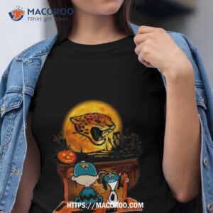 Snoopy And Charlie Brown Jacksonville Jaguars Sitting Under Moon Halloween 2023 T Shirt