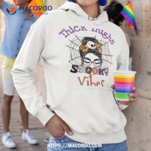 thick thighs and spooky vibes messy bun girl funny halloween shirt hoodie