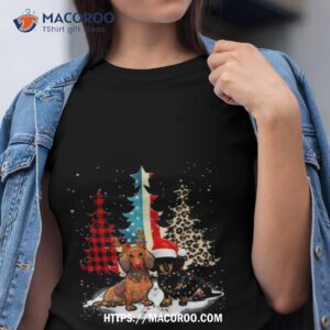 Dachshunds Standing Beside Xmas Trees American Flag Leopard And Plaid Trees Christmas 2023 T Shirt