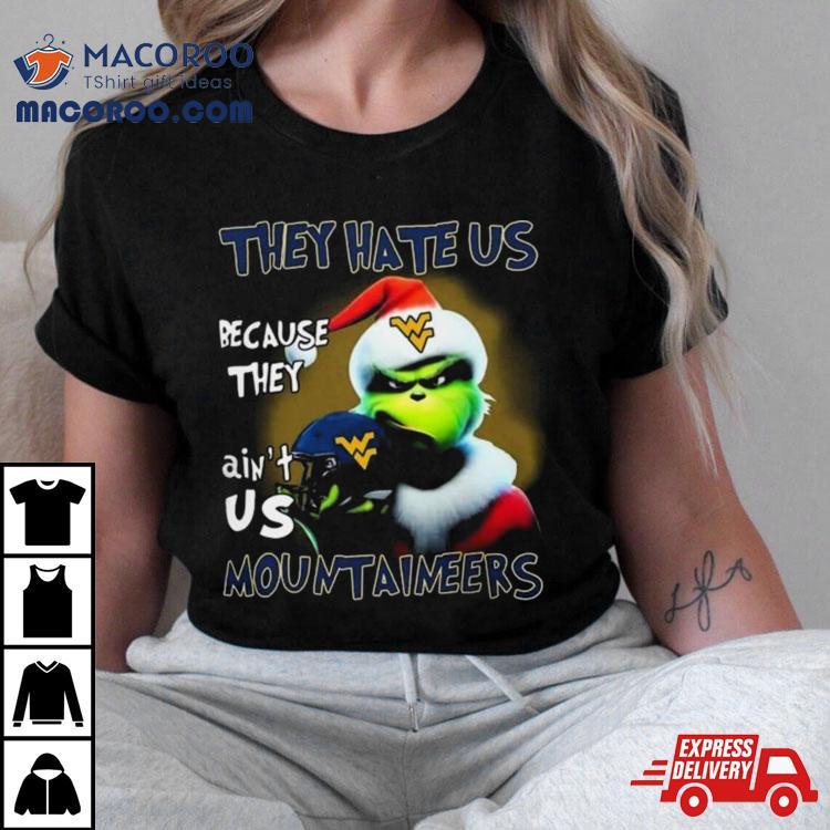 https://images.macoroo.com/wp-content/uploads/2023/11/santa-grinch-christmas-they-hate-us-because-ain-t-us-west-virginia-mountaineers-helme-tshirt-0.jpg