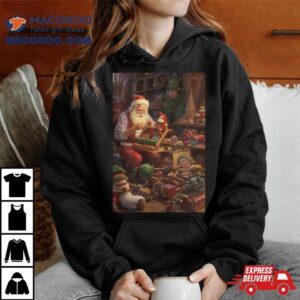 Santa Claus Is Making Decorations Christmas 2023 T Shirt