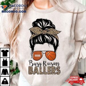 Busy Raising Ballers Basketball And Football Mom Messy Bun Tshirt