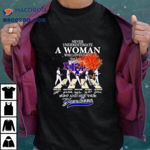 Never Underestimate A Woman Who Loves Fall And Her New York Yankees Walking Across Tshirt