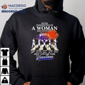 Never Underestimate A Woman Who Loves Fall And Her New York Yankees Walking Across Tshirt