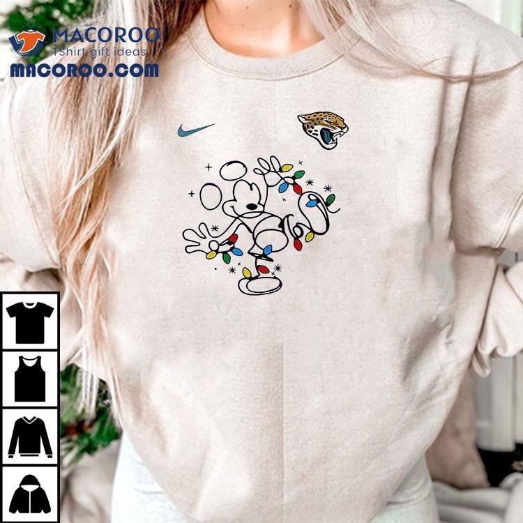 Jacksonville Jaguars X Mickey Mouse Believe In The Magic Of Christmas Shirt Jacksonville Jaguars X Mickey Mouse Believe In The Magic Of Christmas Shirt