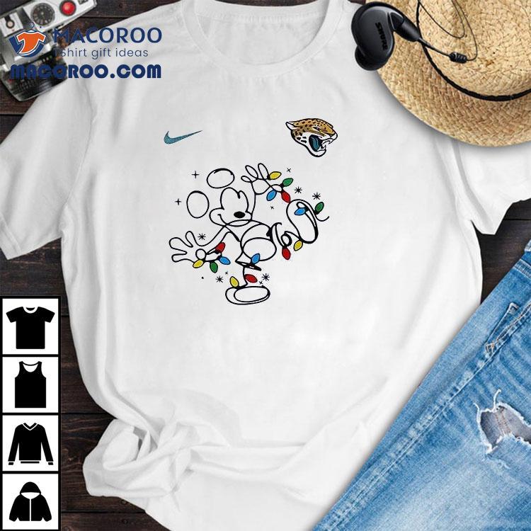 Jacksonville Jaguars X Mickey Mouse Believe In The Magic Of Christmas Shirt Jacksonville Jaguars X Mickey Mouse Believe In The Magic Of Christmas Shirt