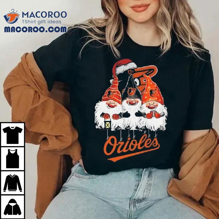 The Gnomes X Baltimore Orioles Merry Christmas 2025 Shirt The Gnomes X Baltimore Orioles Merry Christmas 2025 Shirt