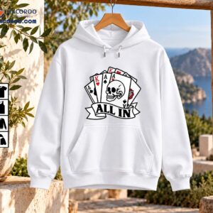 Poker skull shirt design with fanned playing cards, red and black suit symbols, and an ALL IN ribbon banner