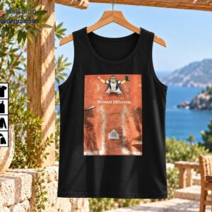 Brewed Different baseball shirt graphic featuring a catcher, baseball mitt, home plate, and reddish dirt field