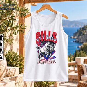 Buffalo Bills Charging Bison Vintage Football Graphic Shirt 2 Vintage football graphic with a charging black and white bison, red helmet, blue geometric shapes, and Buffalo Bills lettering