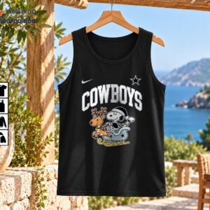 Cowboys Christmas graphic with silver lettering, cartoon dog in Santa outfit, reindeer, and winter sleigh