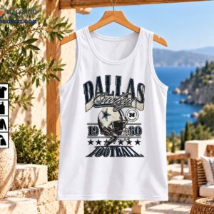 Dallas Cowboys Football Helmet Vintage Stars Graphic Shirt 2 Vintage Dallas Cowboys football graphic with a detailed helmet, navy stars, distressed lettering, and 1960-inspired numbers