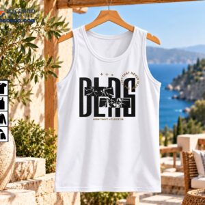 DLDS Night Shift graphic shirt with distressed black lettering, anime-style eyes, gold accents and night shift slogan