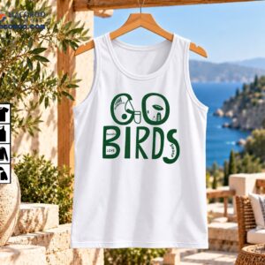 Go Birds Philadelphia Eagles Football Vintage Graphic Shirt 2 Go Birds Philadelphia football shirt design with distressed green lettering, a football, helmet-inspired artwork, and city skyline details