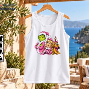 Green Christmas character in pink Santa outfit with a blonde girl in braids and a brown dog wearing pink bows and antlers