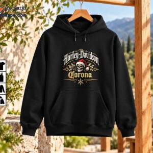Vintage Christmas skeleton graphic with Harley-Davidson lettering, a red Santa hat, gold foliage, and Corona text