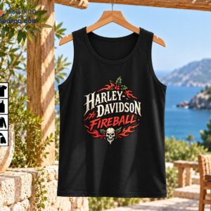 Vintage biker Christmas graphic with cream Harley-Davidson lettering, red Fireball text, flames, holly berries, and a skull