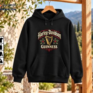Harley-Davidson and Guinness vintage Christmas design with gold lettering, a golden harp, green holly, red berries, and ornate scrollwork
