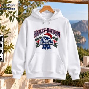 Vintage Christmas graphic with Harley-Davidson lettering, Pabst Blue Ribbon emblem, red Santa hat, snowy holly, and berries