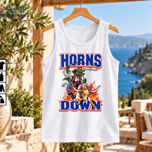 Horns Down shirt graphic with cowboy alligator riding a longhorn bull, blue varsity lettering and orange flames